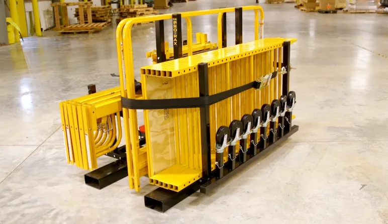 Mobile scaffolding unit with casters in manufacturing facility