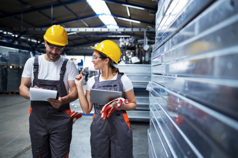 Employees reviewing paperwork